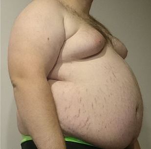 A man with a fat belly.